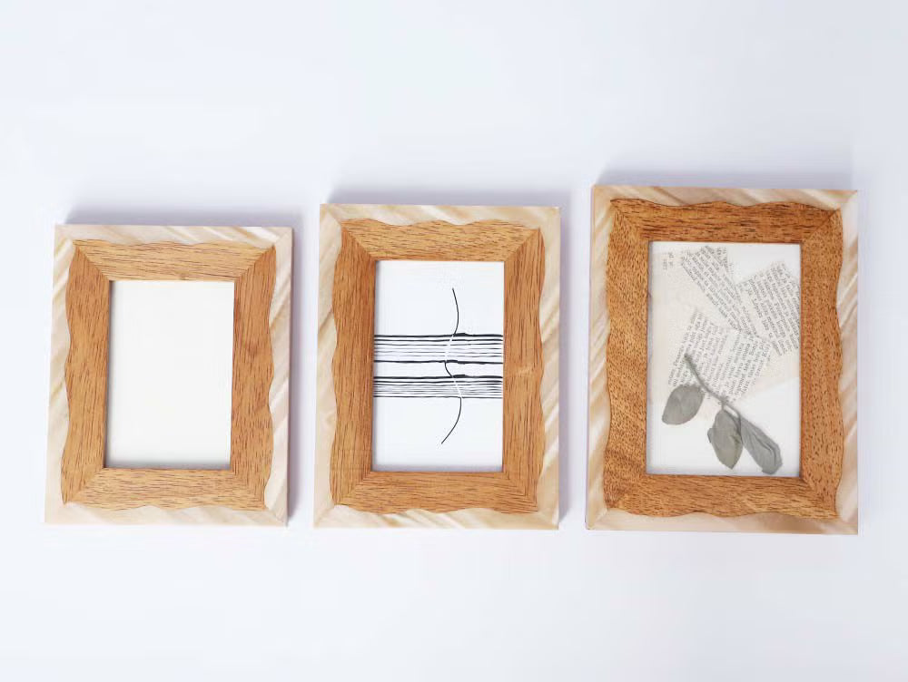 Comu-le Photo Frame
